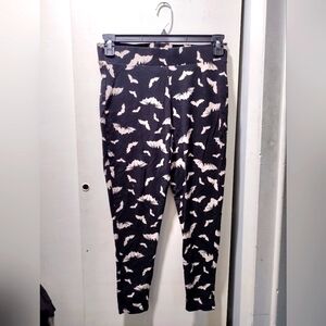 Torrid bat print goth leggings.